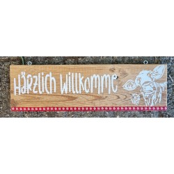 Schild Härzlich Willkomme