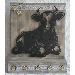 Schild stehend Kuh liegend...