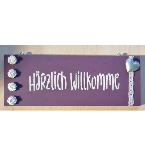 Schild Härzlich Willkomme
