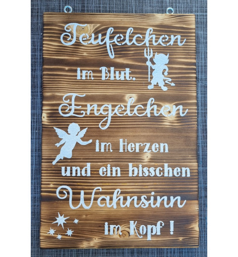 Schild geflammt  " Teufelchen im Blut..."