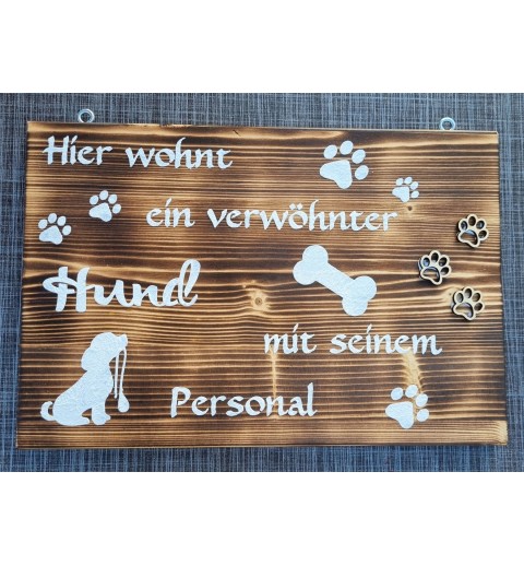 Schild geflammt  " Hier wohnt ein..."
