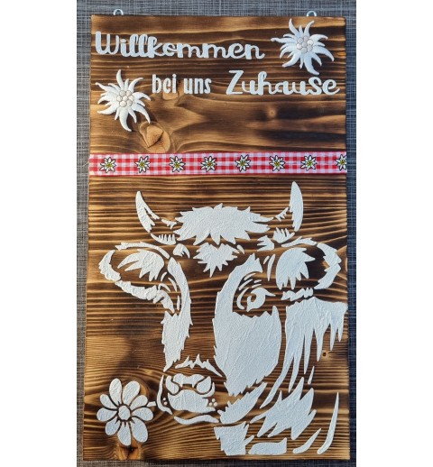 Schild " Willkommen bei uns Zuhause" geflammt