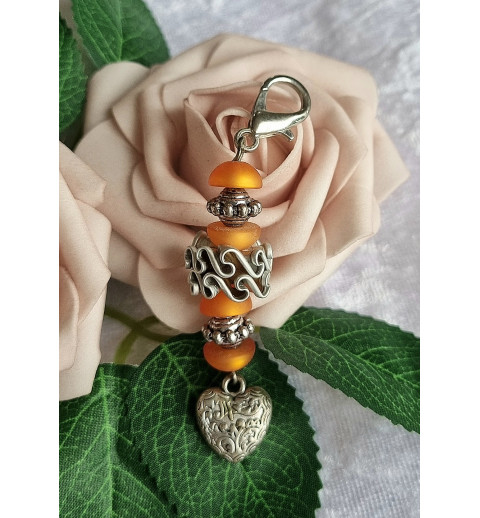 Anhänger Herz und Nespresso Kapseln orange