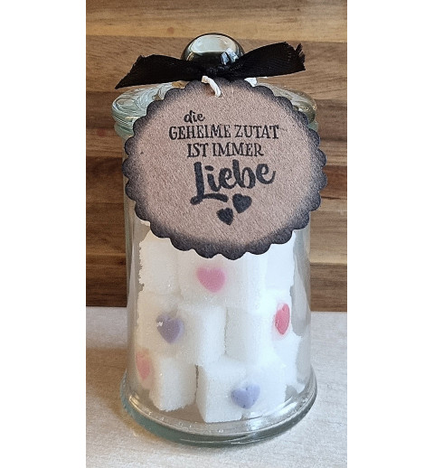 Glas mit Würfelzucker  " Die geheime Zutat...."