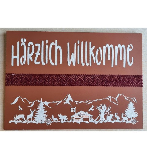 Schild terracotta/weiss/weinrot " Härzlich Willkomme/Alpenfeeling "