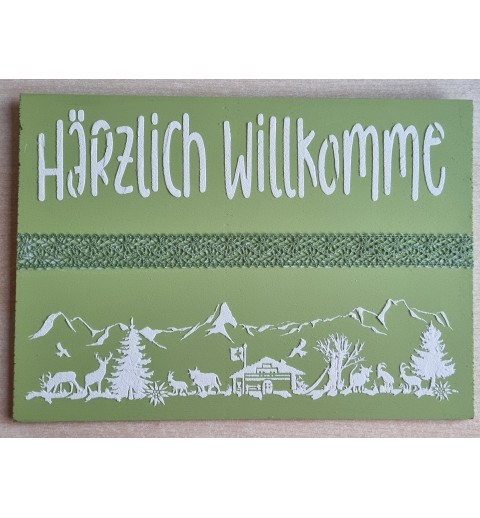 Schild grün/weiss/grün " Härzlich Willkomme/Alpenfeeling "