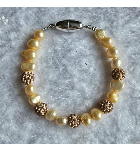 Armband mit verschiedenen Perlen vanille/lachs