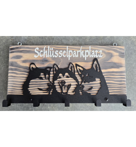 Schlüsselparkplatz Drei Huskys