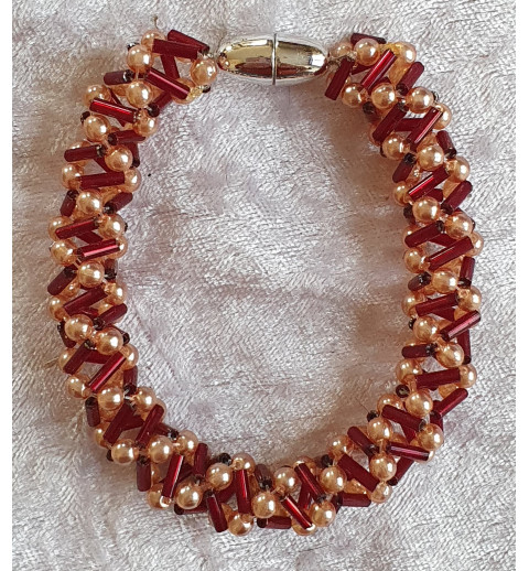 Gefädeltes Armband rot/lachs